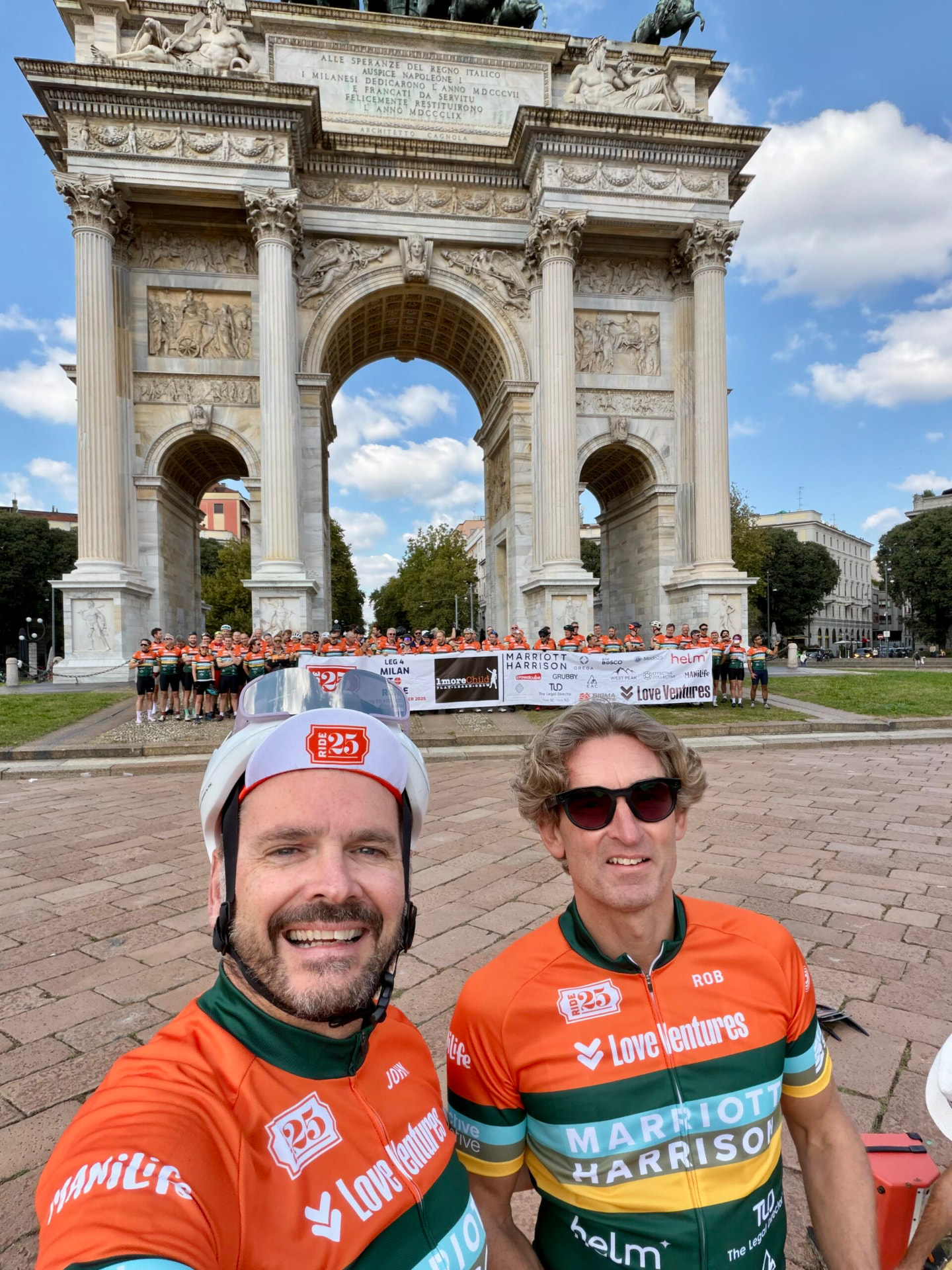 John and Rob at the Arco della Pace in Milan with the Founders Leg 4 group behind