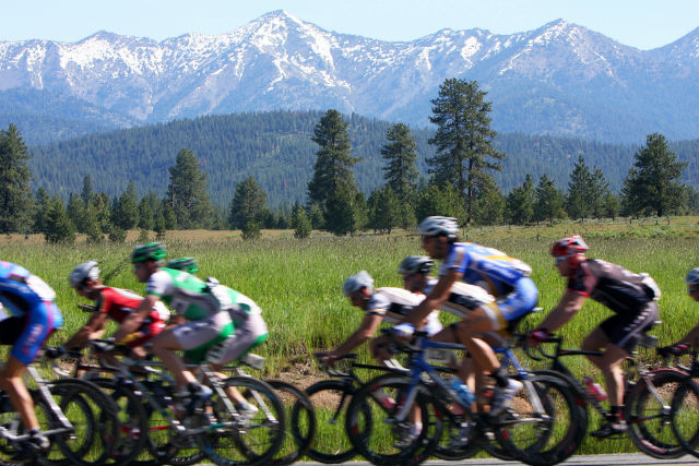 Cycling past a mountain