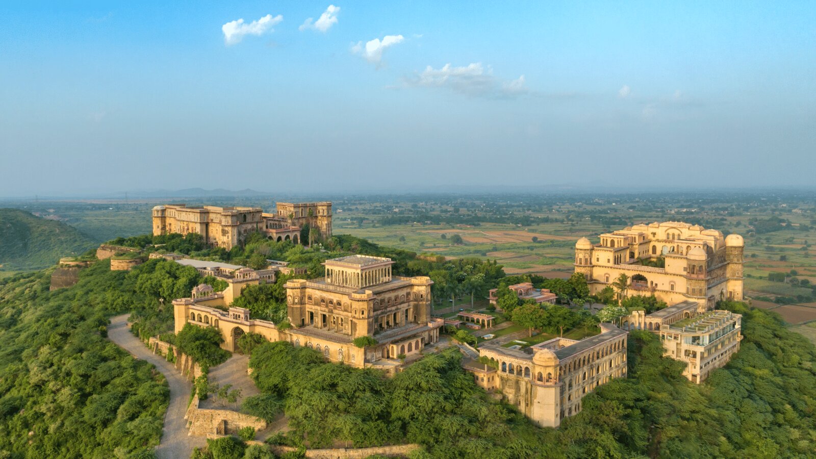 Tijara Fort Palace, Alwar — a stunning 19th century fort converted into a residence, with sprawling gardens and a pool
